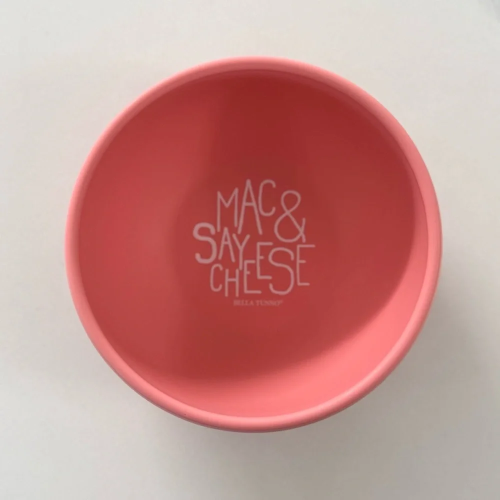 Three Silicone Baby Plates and one Pink Bib
